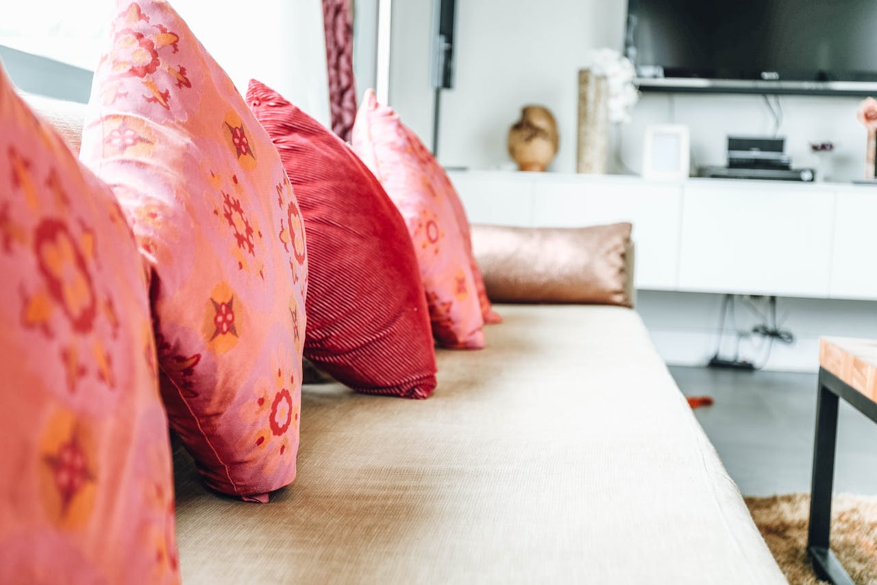 gallery-3 Stylish living room interior with colorful throw pillows and modern furniture.